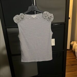 Chic Striped Sleeveless Top with Floral Accents